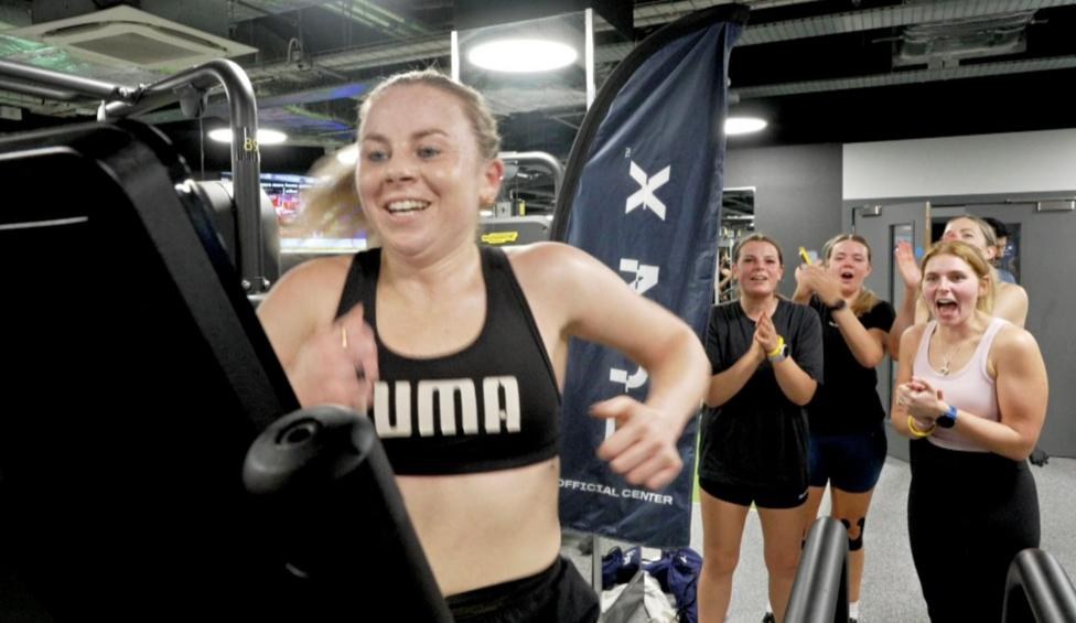 Charlotte Purdue running 5k on a treadmill at one of the gyms